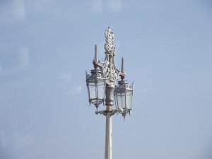 Victorian glass lamp shades would have been enlarged to house the birds